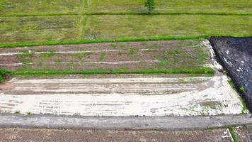 Aerial view of green fields and farmlands in rural Thailand. photo