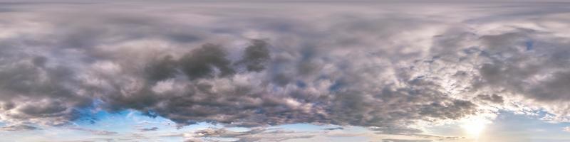 Seamless cloudy blue evening sky hdri panorama 360 degrees angle view before sunset with zenith and beautiful clouds in equirectangular projection for use in 3d graphics as sky dome or edit drone shot photo