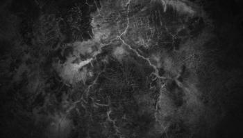 Scary dark walls, slightly light black concrete cement texture for background. surface dark grunge panorama landscape photo