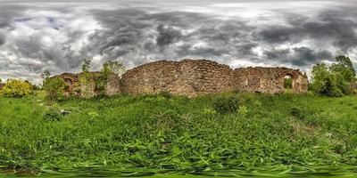 full seamless hdri panorama 360 degrees angle view near walls of abandoned ruined stone farm building  in equirectangular projection. VR AR content photo