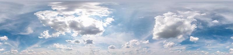 Seamless cloudy blue sky hdri panorama 360 degrees angle view with zenith and beautiful clouds for use in 3d graphics as sky dome photo