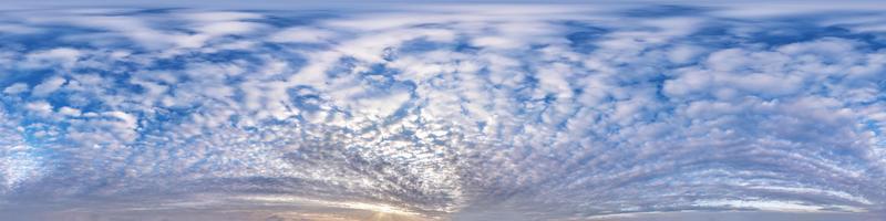 Seamless hdri panorama 360 degrees angle view blue sky with beautiful fluffy cumulus clouds without ground with zenith for use in 3d graphics or game development as sky dome or edit drone shot photo