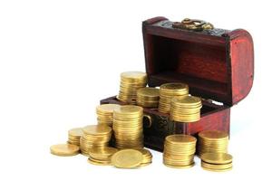 A wooden ancient chest full of money photo