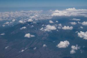 Bali island in tropical sea, veiw from airplane sight photo