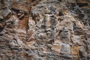 fondo de textura de pared de roca de piedra foto