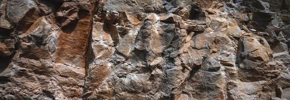 fondo de textura de pared de roca de piedra foto
