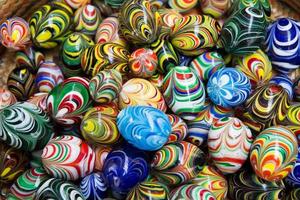 Background of colorful glass marbles as a metaphor for diversity photo