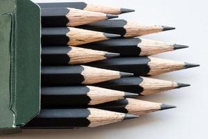 sharp tips of set of black graphite pencils photo