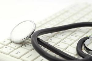 Stethoscope on the keyboard photo