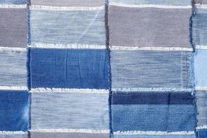 patchwork from many various denim flaps photo