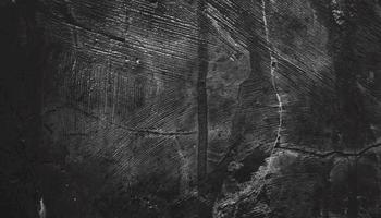 Scary dark walls, slightly light black concrete cement texture for background. surface dark grunge panorama landscape photo