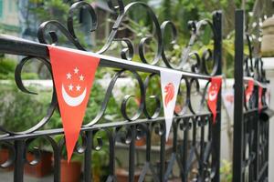 banderas de singapur para la celebración del día nacional foto