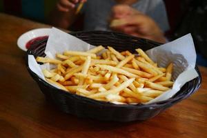 top view of french fries on a bowl on table photo