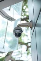 CCTV security camera operating outdoor photo