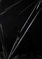 Black transparent plastic wrap texture overlay background. Realistic plastic for poster design and photo overlay effect. Wrinkled plastic surface pattern for graphic design sources and element.