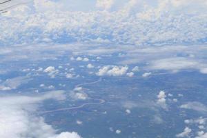 Aerial view of peaceful earth covered in clouds photo