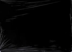 Black transparent plastic wrap texture overlay background. Realistic plastic for poster design and photo overlay effect. Wrinkled plastic surface pattern for graphic design sources and element.