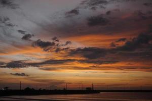 Sunrise with orange cloud photo