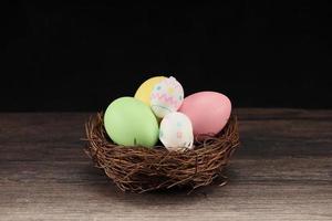 Easter rabbit with colorful eggs photo