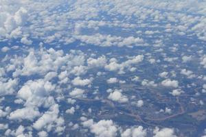 Aerial view of peaceful earth covered in clouds photo