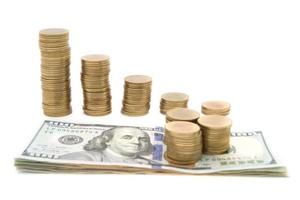 Stack of coins and money and stethoscope photo