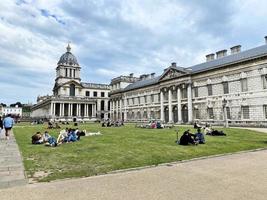 London in the UK in June 2022. Tourists enjoying Greenwich in London photo