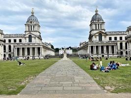 London in the UK in June 2022. Tourists enjoying Greenwich in London photo