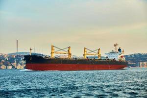 Bulk carrier in Bosphorus Strait, Istanbul, Turkey photo