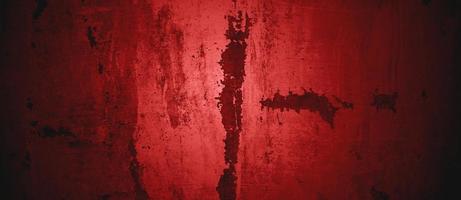 Dark red Wall Texture Background. Halloween background scary. Red and Black grunge background with scratches photo