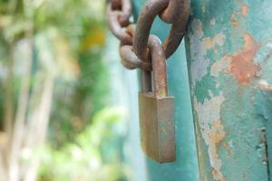 date door was locked with padlocks and chains photo