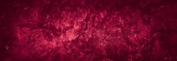 dark red grungy abstract cement concrete wall texture background photo
