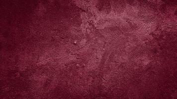 dark red grungy abstract cement concrete wall texture background photo