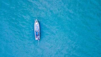 Fishing boat in the sea photo