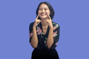 Young Asian Woman with Attractive Gesture photo