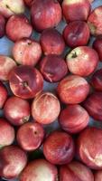 a beautiful fragrant ripe nectarine, the view from the top. photo