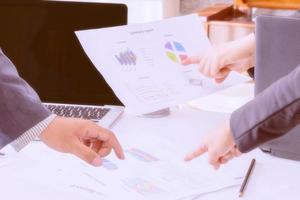 Business adviser consulting with team. photo