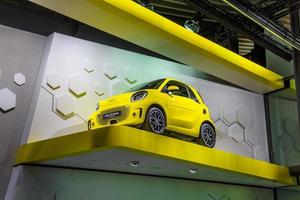 FRANKFURT, GERMANY - SEPT 2019 yellow SMART EQ FORTWO small electric car from MERCEDES-BENZ, IAA International Motor Show Auto Exhibtion photo