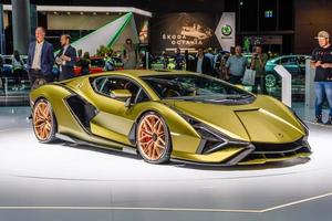 FRANKFURT, GERMANY - SEPT 2019 yellow golden LAMBORGHINI SIAN FKP 37 is a mid-engine hybrid sports car. It is the first hybrid production vehicle produced by the brand, IAA International Motor Show Au photo