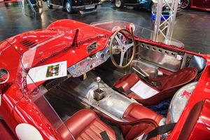 FRIEDRICHSHAFEN - MAY 2019 interior of red MASERATI MISTRAL 300S TRIBUTE R 1966 cabrio roadster at Motorworld Classics Bodensee on May 11, 2019 in Friedrichshafen, Germany photo