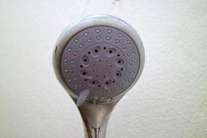 The end of the shower head is rounded for bathing photo