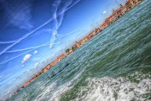 Waves and splashes of water in the Mediterranean sea, Venice, Italy HDR photo