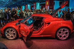 FRANKFURT - SEPT 21 ALFA ROMEO 4C presented as world premiere at the 65th IAA Internationale Automobil Ausstellung on September 21, 2013 in Frankfurt, Germany photo