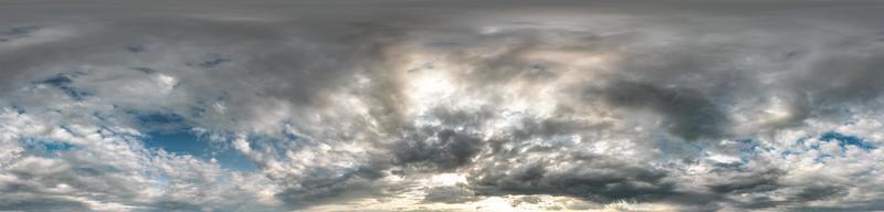 Seamless cloudy blue sky hdri panorama 360 degrees angle view with zenith and beautiful clouds for use in 3d graphics as sky dome photo