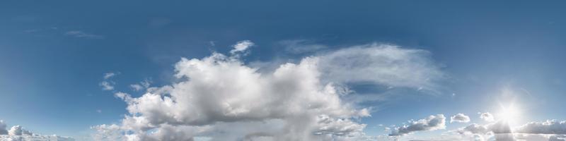 Seamless cloudy blue sky hdri panorama 360 degrees angle view with zenith and beautiful clouds for use in 3d graphics as sky dome or edit drone shot photo