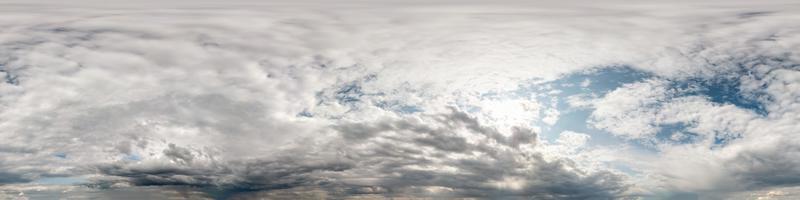 Seamless cloudy blue sky hdri panorama 360 degrees angle view with zenith and beautiful clouds for use in 3d graphics as sky dome or edit drone shot photo