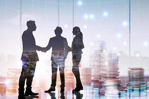 silhouette business people shake hands and negotiate of investor in office with business finance money stacked and growing up, success and  teamwork concept photo