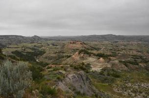 Thick Dark Cloudy Sky Over a Canyon in the Badlands photo