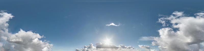 blue sky with beautiful cumulus clouds. Seamless hdri panorama 360 degrees angle view with zenith for use in 3d graphics or game development as sky dome or edit drone shot photo