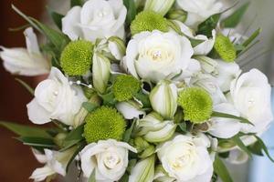 bright wedding bouquet of summer white pink flowers photo