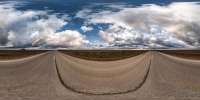 full seamless spherical hdri panorama 360 degrees angle view on asphalt road among fields in autumn day with beautiful clouds in equirectangular projection, ready for VR AR virtual reality content photo